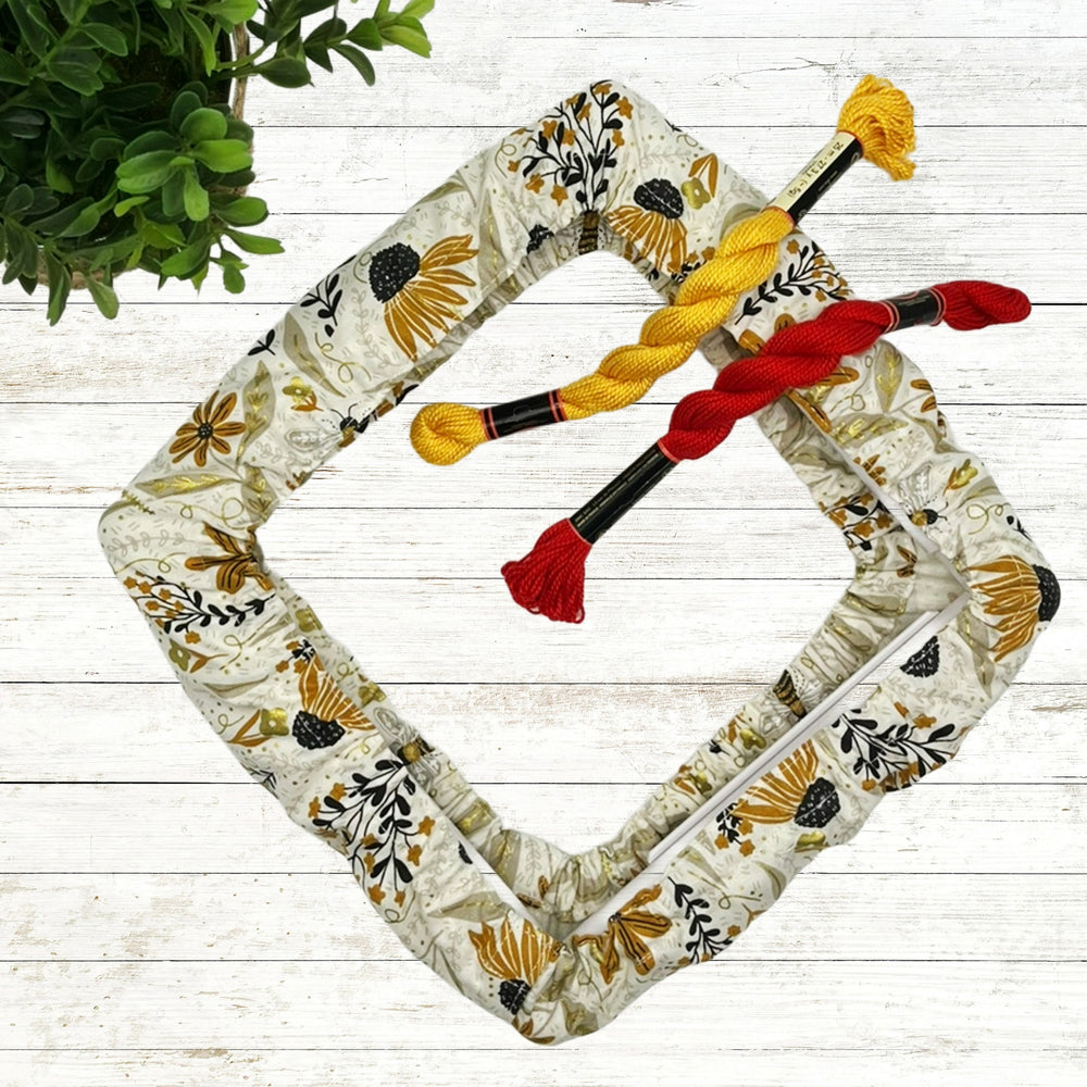 Bee theme fabric qsnap grime guard featuring bees, flowers on tan background