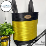 Garbage bag for car made from seatbelt webbing - black and military gold