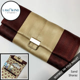 Tri-fold wallet with brown and beige design on a white background, featuring Lake Wind Studio branding.