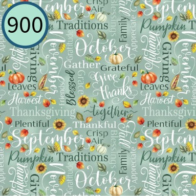 Textured fabric with autumnal words and pumpkins on a teal background