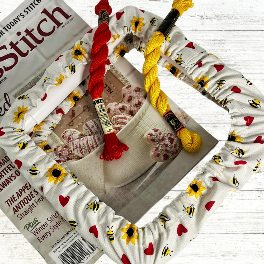 Qsnap grime guards in bee theme fabric with bees and red hearts.