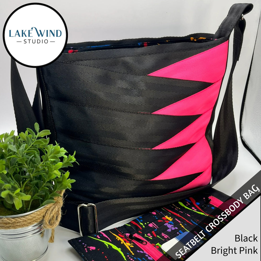 Crossbody seatbelt bag - black and pink