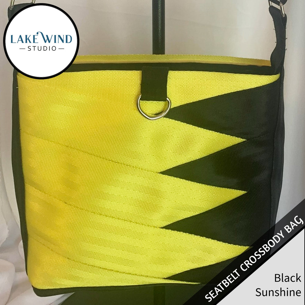 Crossbody seatbelt bag - black and yellow