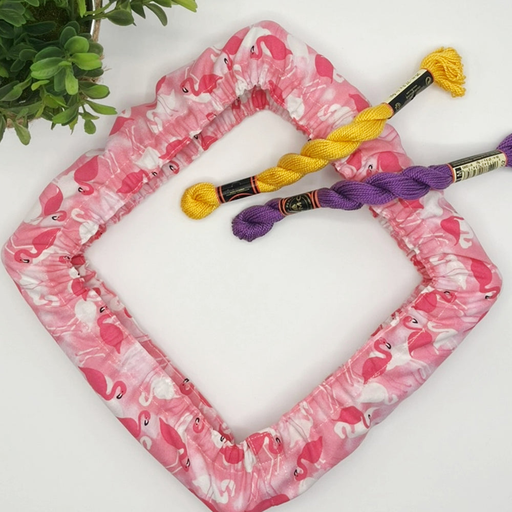 Pink flamingo-patterned qsnap frame grime guard.