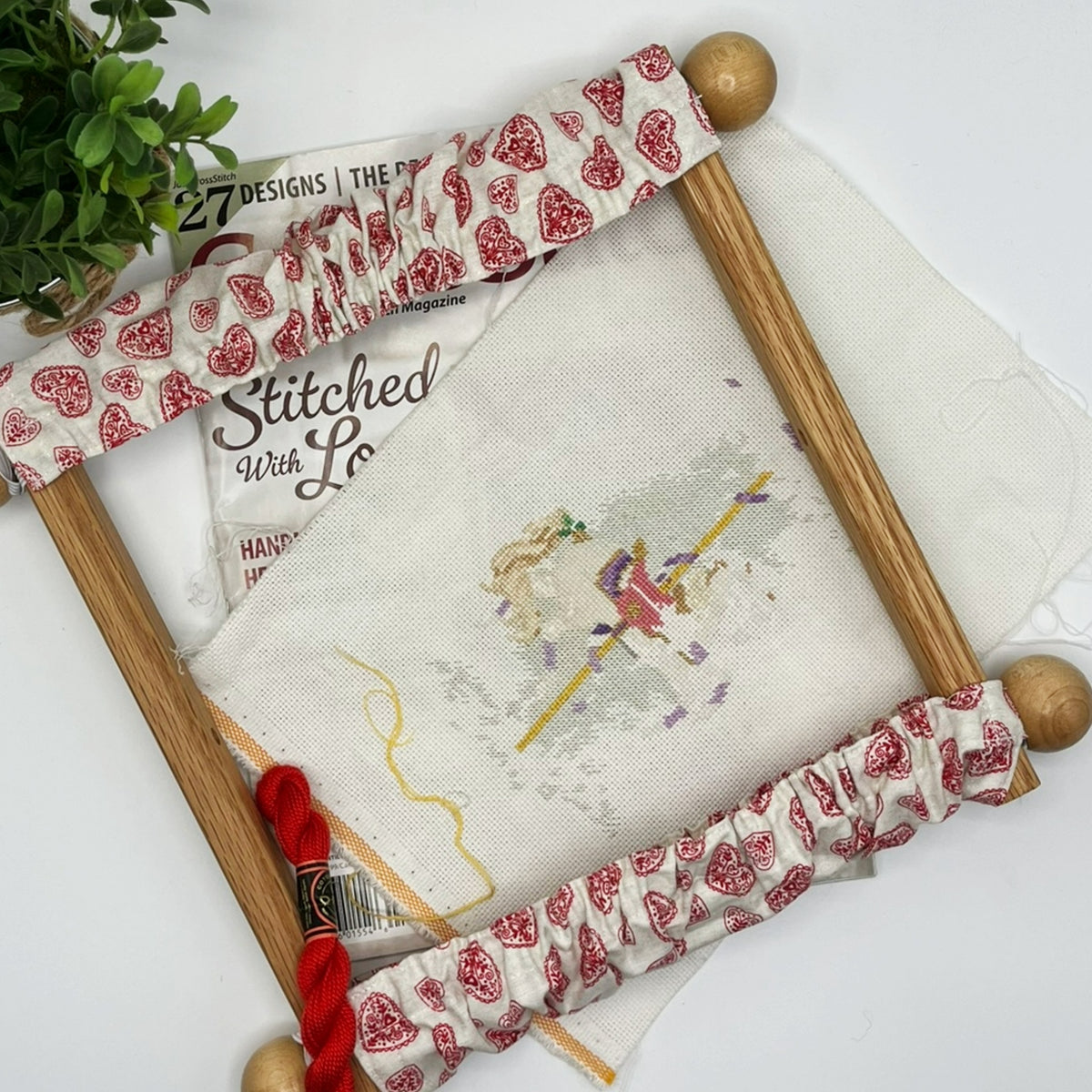 Wooden embroidery scroll frame grime guard with vintage hearts.